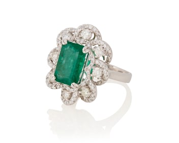 A Platinum, Emerald and Diamond Ring