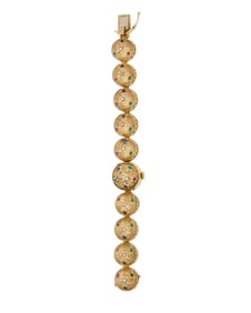 Piaget: A 14K Gold and Gem-Set Surprise Watch