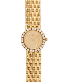Baume & Mercier: An 18K Gold and Diamond Watch