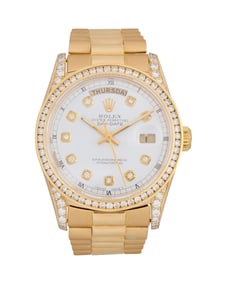 An 18K Gold and Diamond Watch