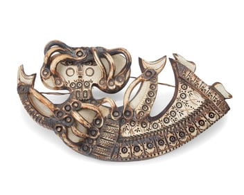 Dora De Larios (1933-2018), A stoneware figural wall sculpture, circa 1965