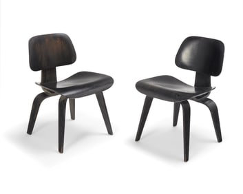Charles and Ray Eames (1907-1978 and 1912-1988), A pair of ebonized DCW molded plywood side chairs