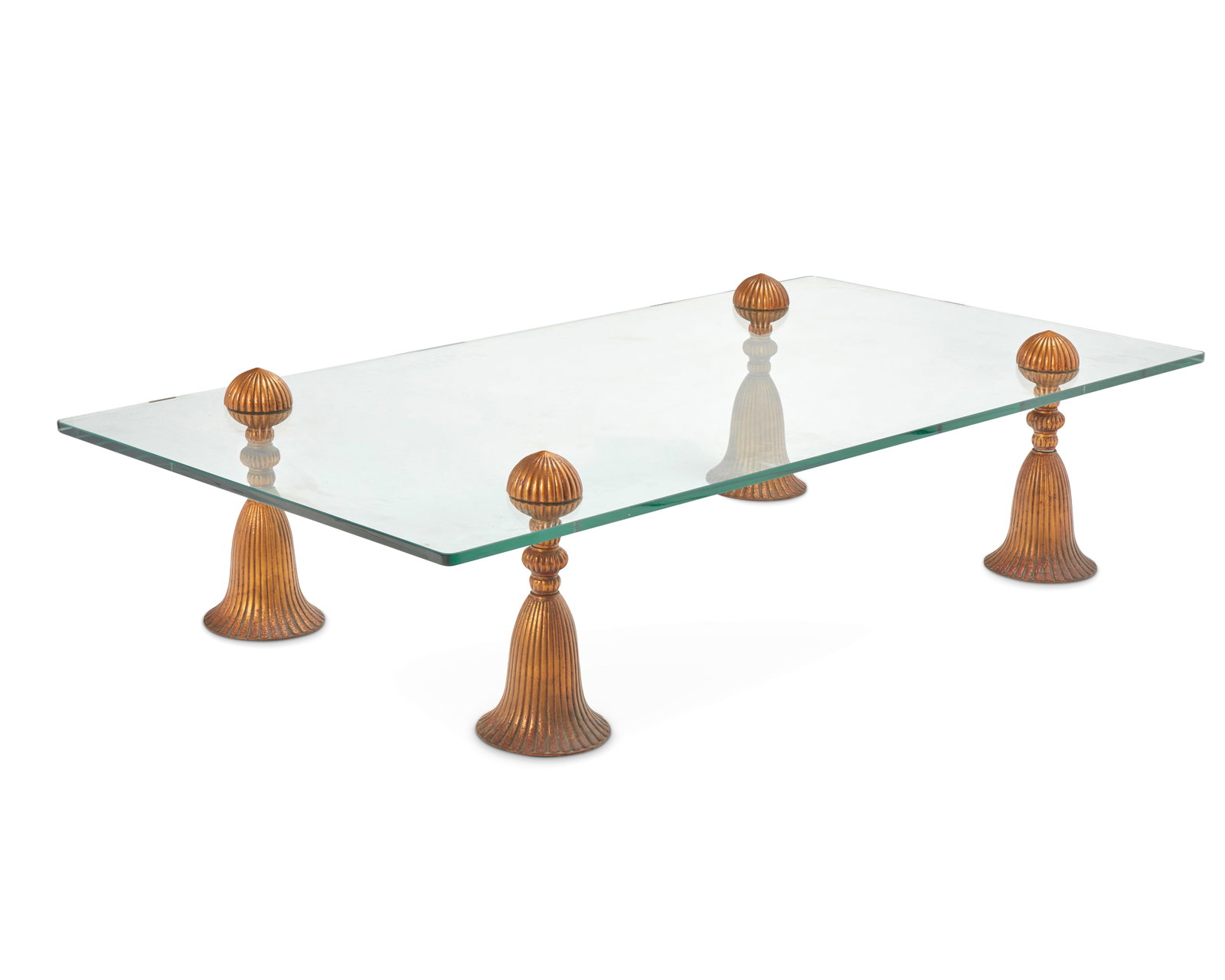 Phyllis Morris (1925-1988), A tassel coffee table, late 20th century: Phyllis Morris (1925-1988)A tassel coffee table, late 20th centuryUnmarkedThe glass top supported on gilt-bronze tassel-form legs17.5" H x 72" W x 36" D