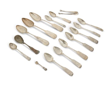A group of sterling silver spoons