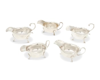 A group of English sterling silver sauceboats