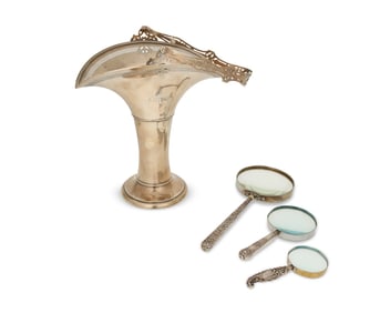 Three English sterling silver magnifying glasses and a wedding basket