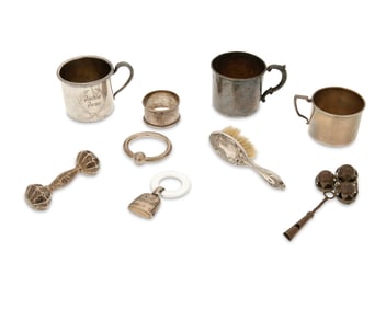 A group of sterling silver and silver-plated baby articles