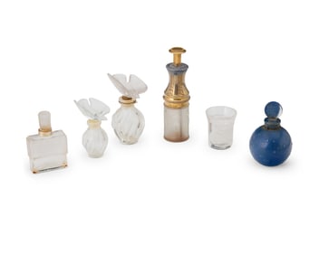 A group of Lalique glass perfume bottles
