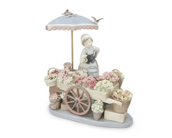 A Lladro porcelain 'Flowers of the Season' figurine
