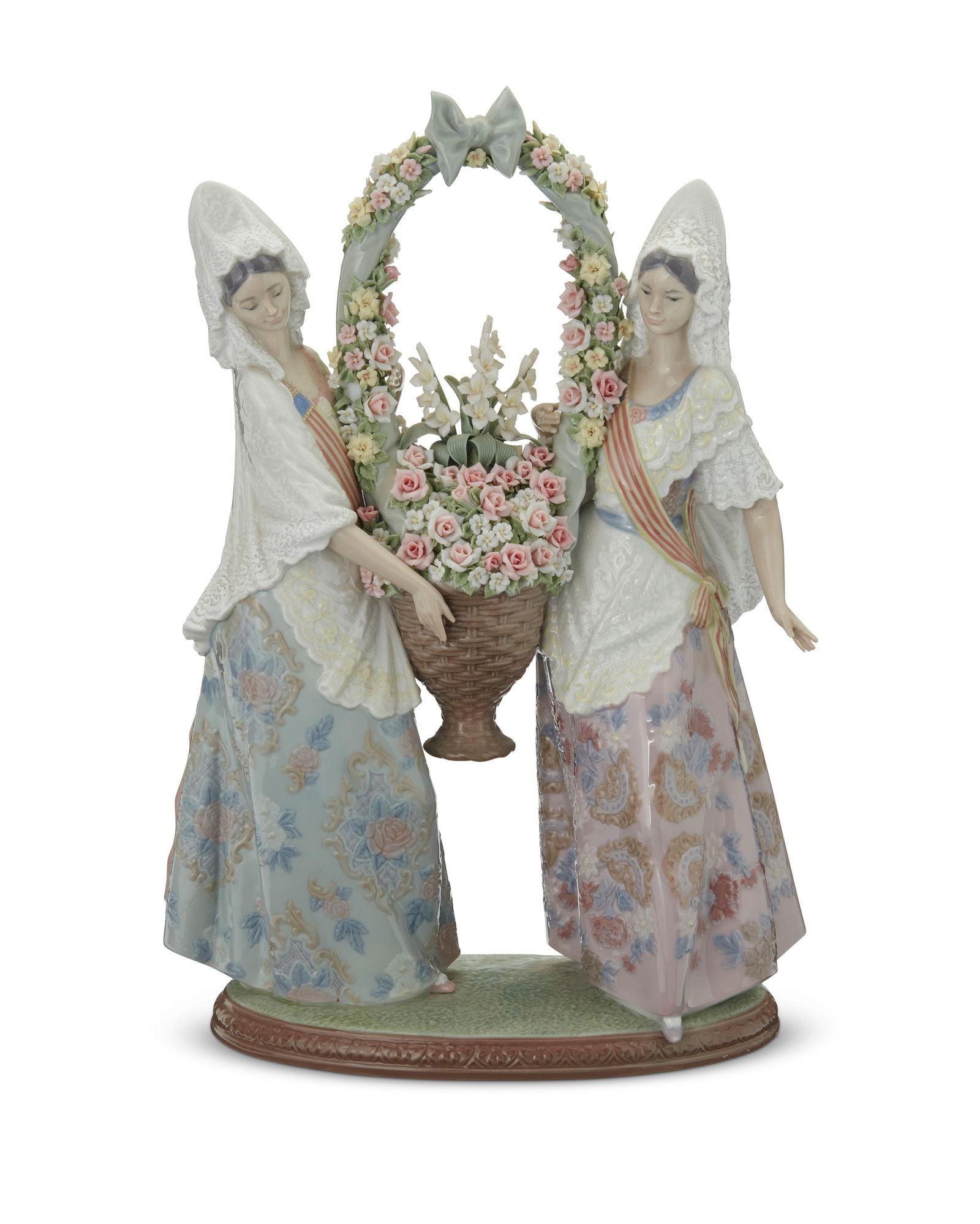 A Lladro porcelain 'The Floral Offering' figurine (1 of 3)