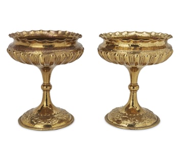 A pair of Egidio Casagrande brass compotes