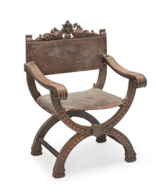 A Continental walnut and leather Savonarola chair