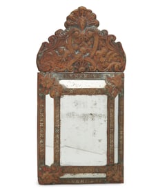 A Spanish Revival-style tole framed mirror