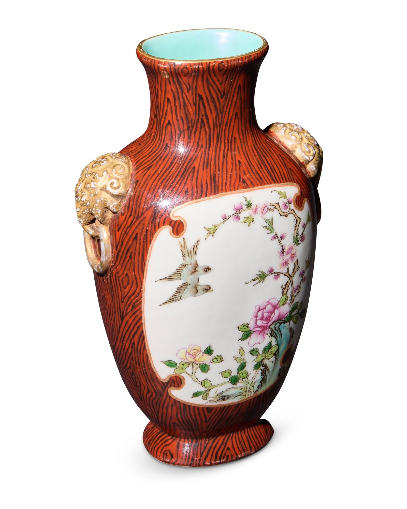 A Chinese faux bois porcelain baluster vase: A Chinese faux bois porcelain baluster vaseLate Qing Republic (late 19th/early 20th century)Bearing blue underglaze seal to undersideCentering reserves of flowering branches and birds on a white groun