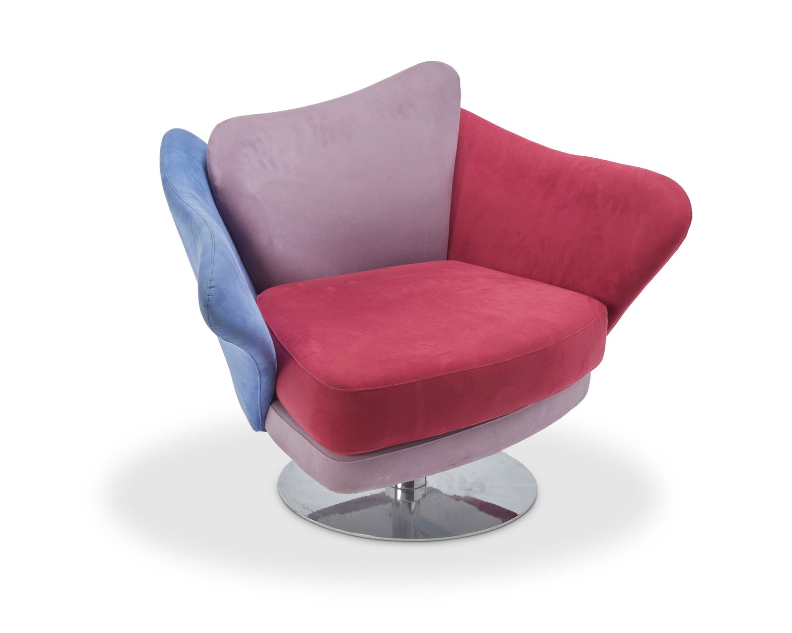 Giuseppe ViganÚ (b. 1952), A 'Flower Swivel Chair' for Il Loft, early 21st century: Giuseppe ViganÚ (b. 1952)A 'Flower Swivel Chair' for Il Loft, early 21st centuryMarked in the underside dust cover in pattern: Il LoftThe petal-form seatback and armrests upholstered in a faux suede