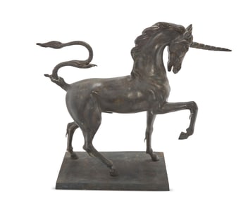 A patinated bronze model of a unicorn