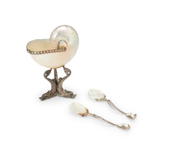A sterling silver and seashell caviar server