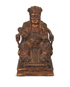 A Chinese carved wood deity figure