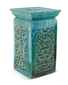 An Asian-style glazed ceramic pedestal