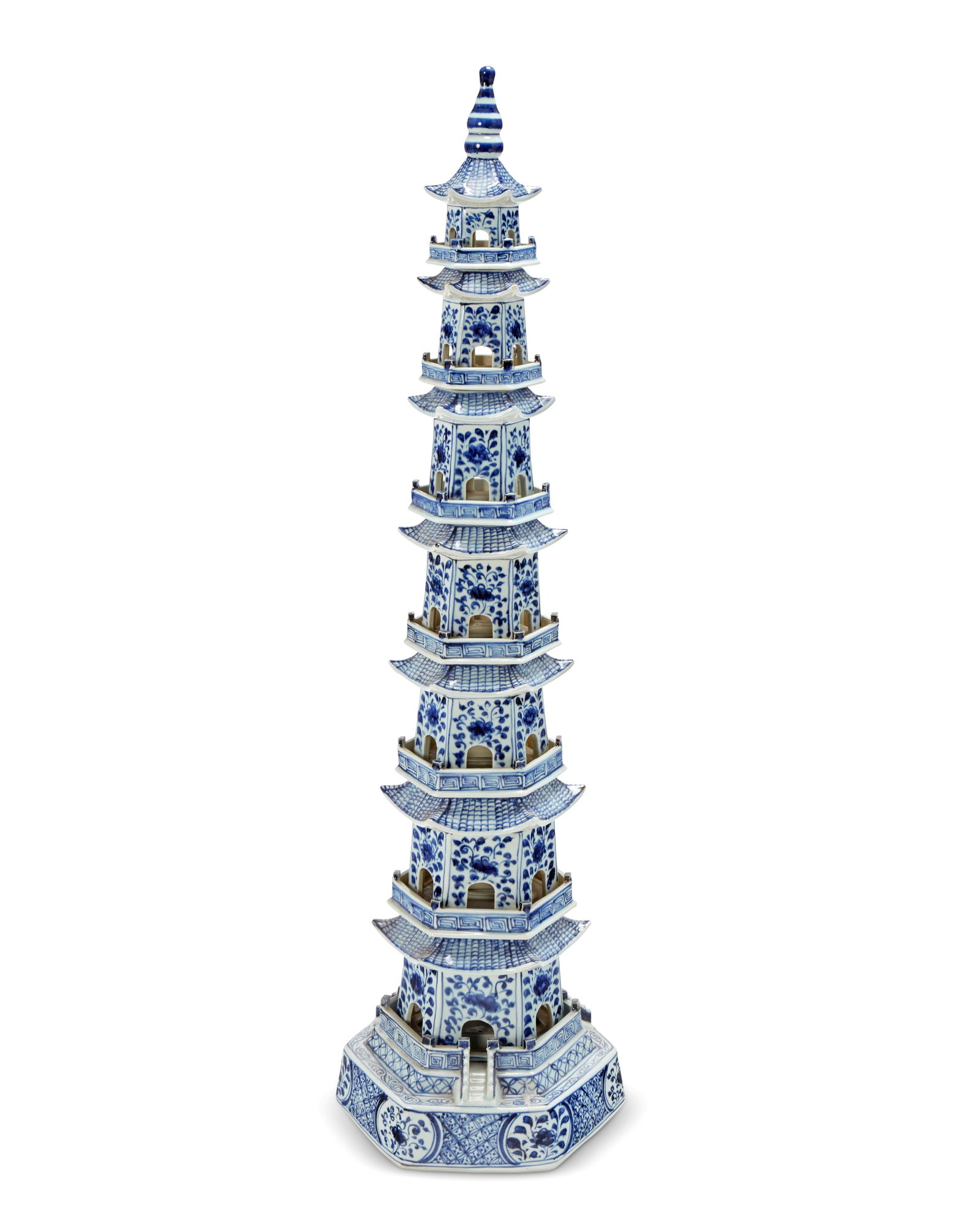 A Chinese blue and white porcelain pagoda: A Chinese blue and white porcelain pagoda20th centuryUnmarkedThe seven-tiered model decorated with floral and meandering motifs48" H x 13.5" W x 12" D