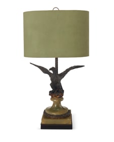 A bronze eagle-form table lamp