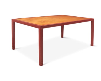 A Modern carved wood dining table