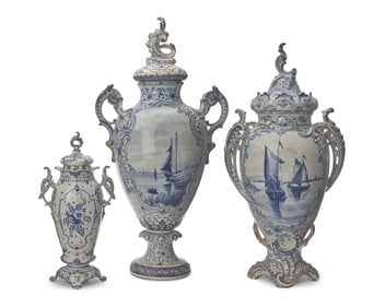 Three Royal Bonn earthenware 'Delft' covered urns