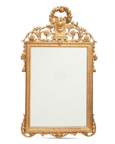 A Louis XVI-style giltwood mirror