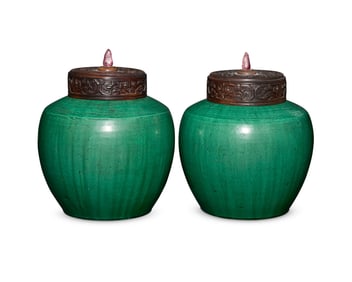 A pair of Chinese green glazed pottery ginger jars