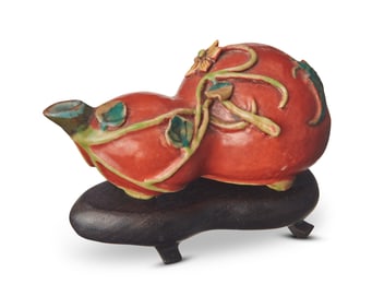 An East Asian polychrome enameled porcelain water dropper