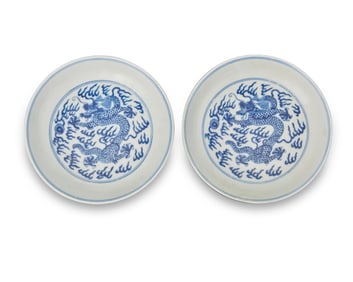 A pair of Chinese blue and white porcelain dragon dishes