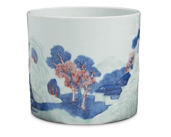 A Chinese blue and white and copper red porcelain brush pot