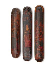 Three Persian polychrome wood and papier-m‚che figural pen boxes