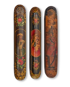 Three Persian polychrome wood and papier-m‚che figural pen boxes