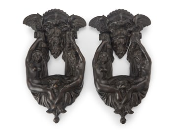 A pair of Italian Renaissance-style patinated bronze door knockers