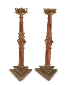 A pair of Spanish Colonial carved wood torcheres