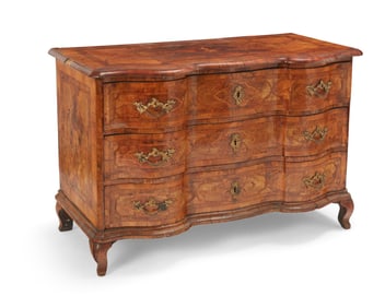 A German Baroque inlaid walnut commode