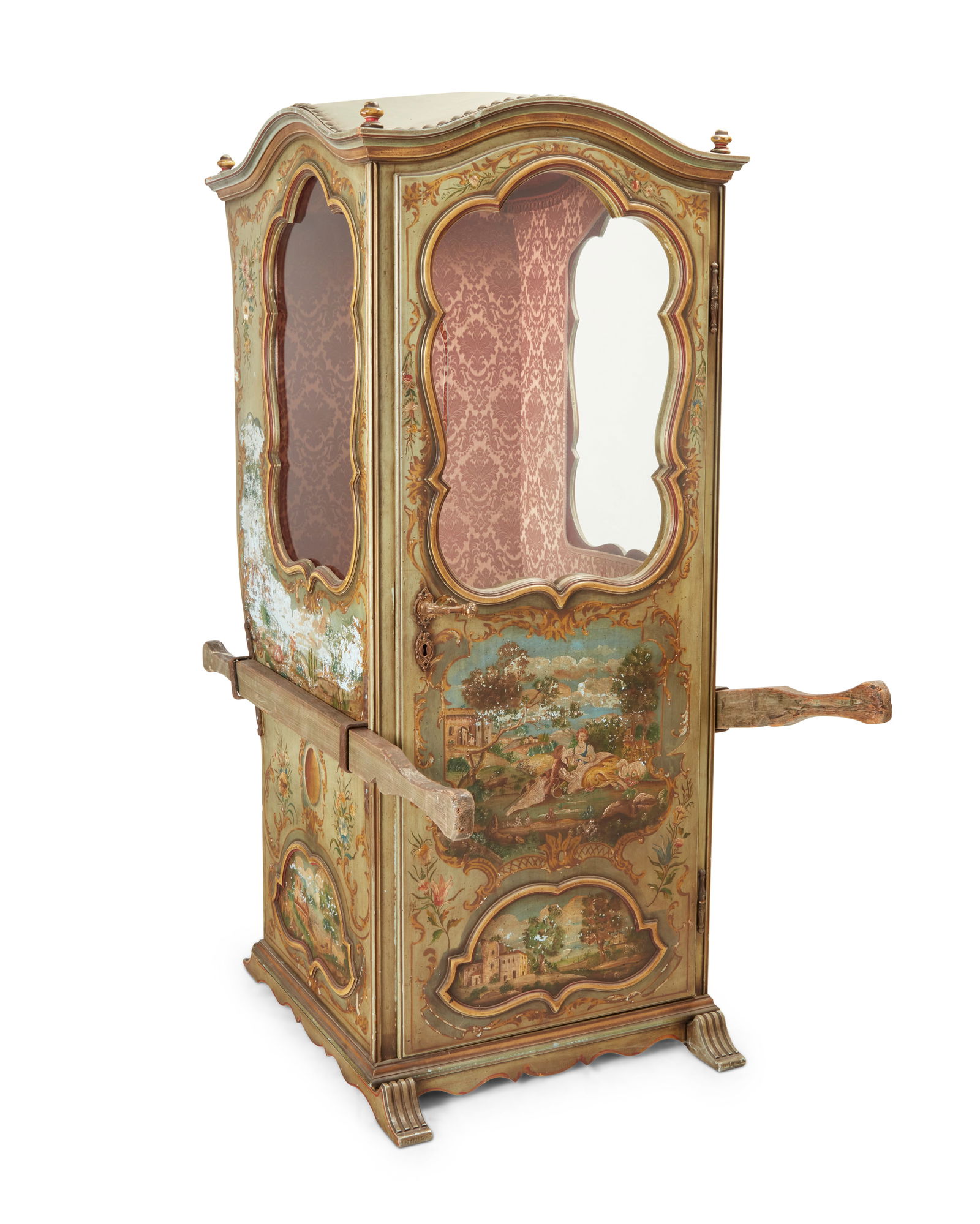 A Venetian Rococo-style painted wood sedan chair: A Venetian Rococo-style painted wood sedan chair20th centuryThe single-person cabin with a curved roof, painted with rural landscape scenes, featuring two glass windows and glazed hinged door revealin
