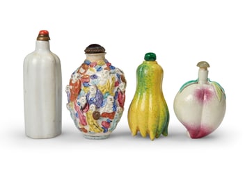 Four Chinese porcelain snuff bottles