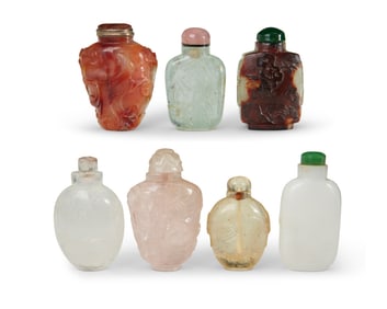 A group of Chinese carved stone snuff bottles