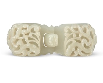 A Chinese carved jade dragon two-part belt buckle