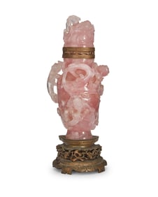 A Chinese carved rose quartz covered urn converted lamp