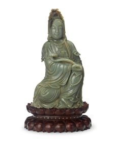 A large Chinese carved jade figure of Guanyin