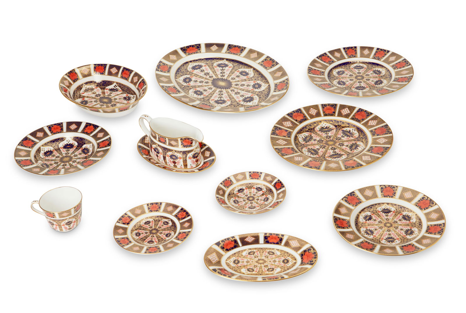 A Royal Crown Derby bone china 'Old Imari' dinner service: A Royal Crown Derby bone china 'Old Imari' dinner service20th centuryMost marked: Royal Crown Derby / English Bone China / [logo with crown] / Old Imari / 1128; most date marked for 1988: LI; two earl