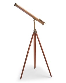 A large brass telescope in fitted case