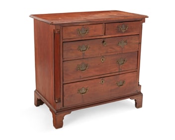 A Chippendale mixed wood chest of drawers