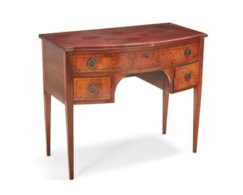 A George III mahogany small bow-front sideboard