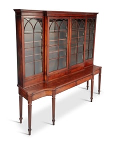 A George III mahogany breakfront on stand