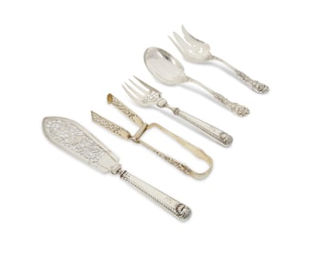 A group of sterling silver serving utensils