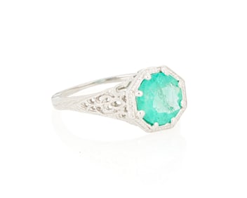 An 18K White Gold and Emerald Ring